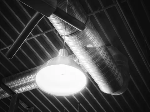 Spiral ductwork above a light fixture