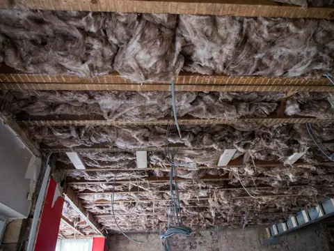 Insulation between ceiling joists