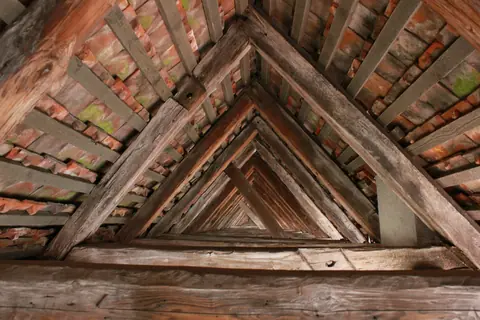Attic roof framing and brick