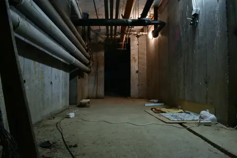 Basement corridor with pipes